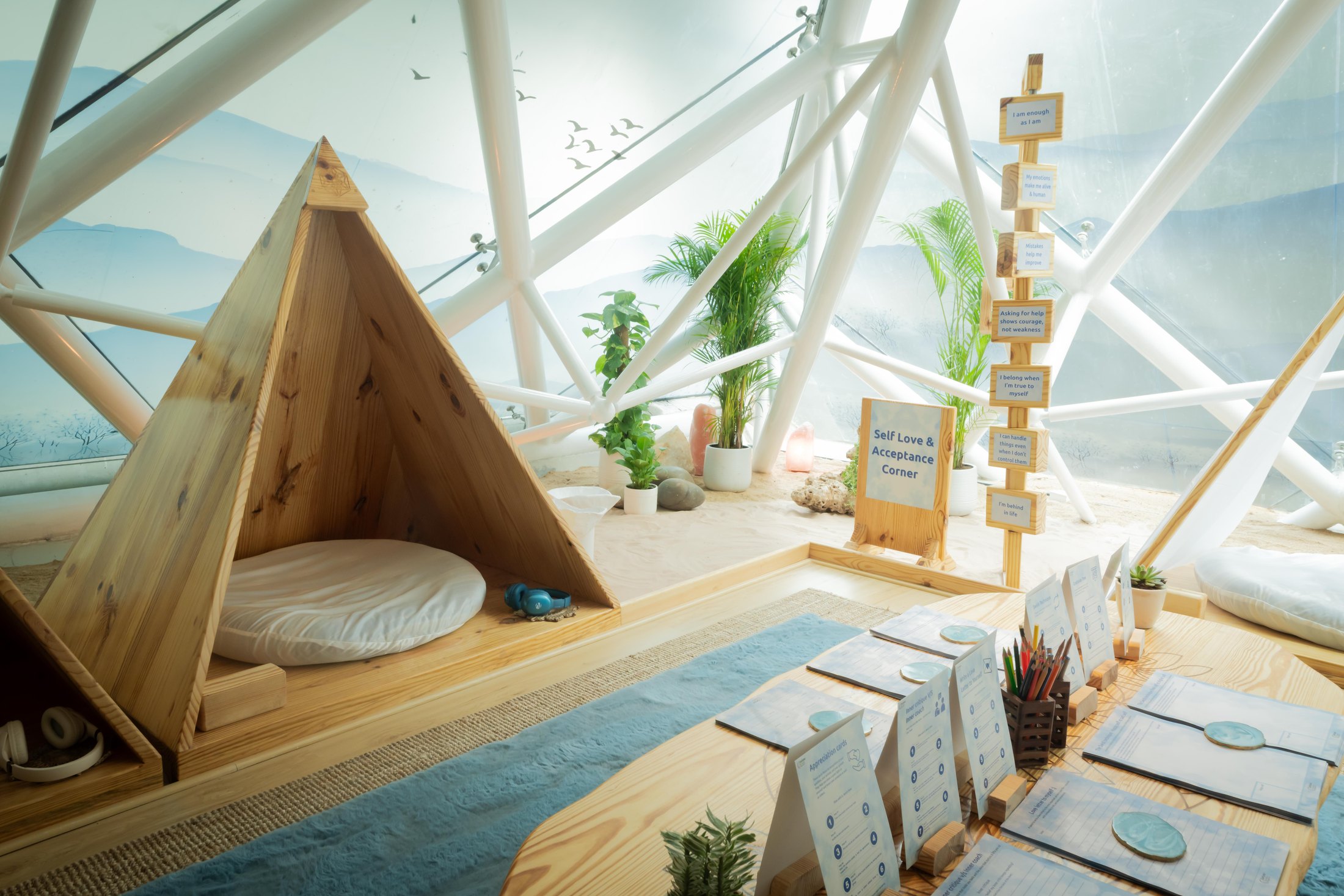 The Self Love and Acceptance Corner beneath a geodesic dome