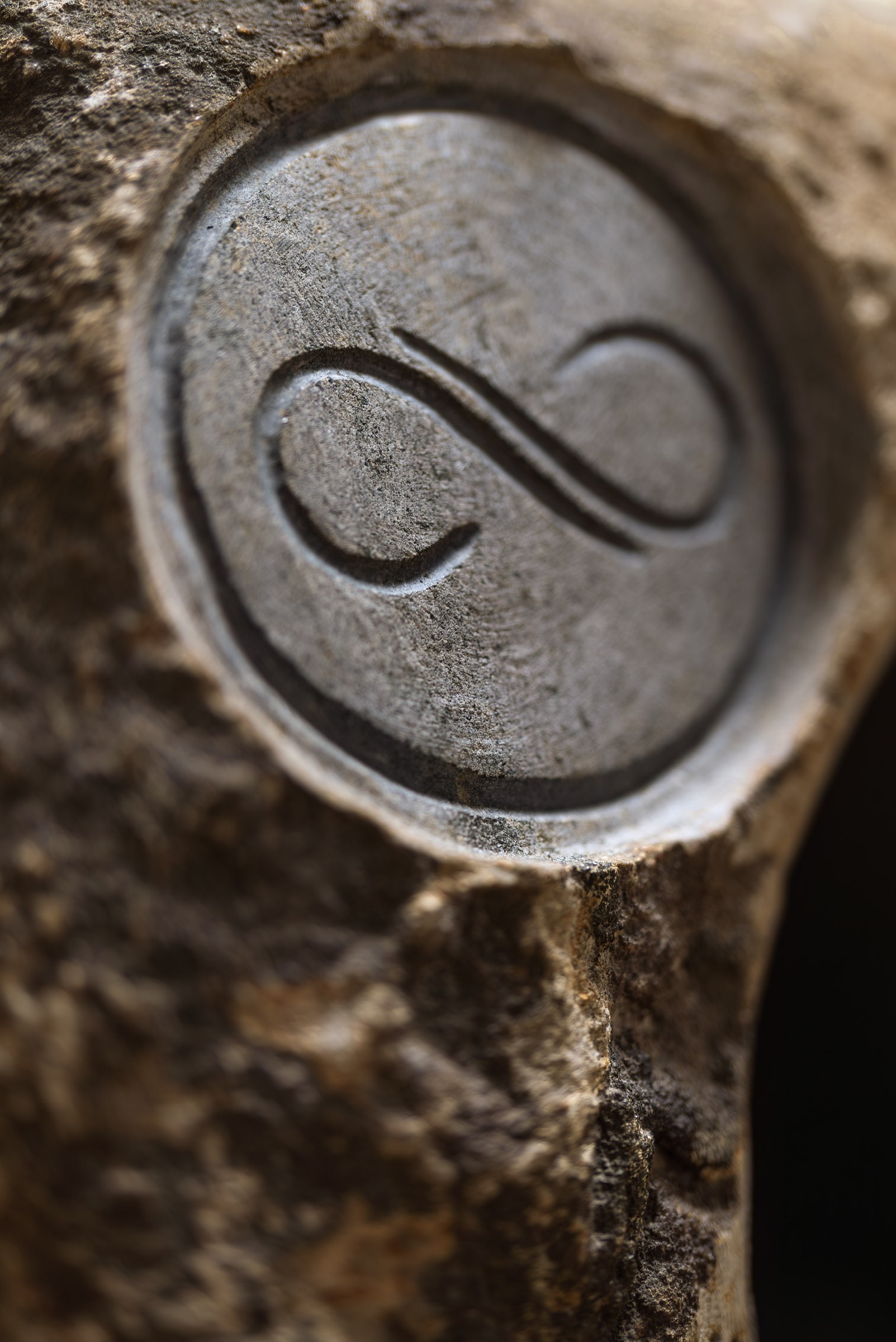 Infinity symbol carved into stone